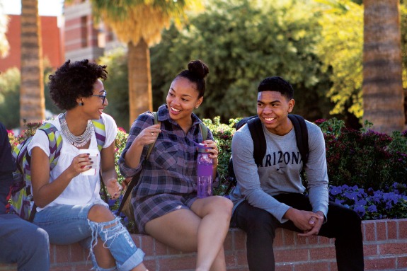 Three Black students sit together on the University of Arizona campus