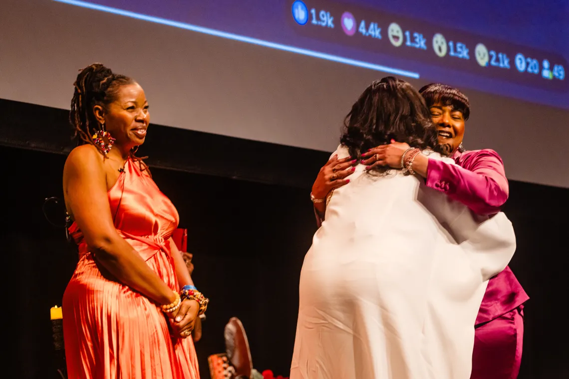 Drs. King and Shabazz embrace