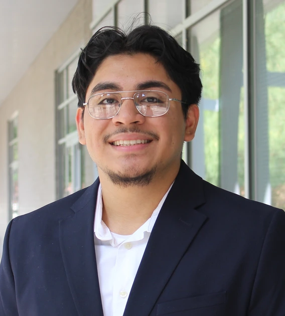 Person wearing glasses smiling